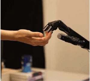 Image: The prototype robotic hand touching a human hand (Photo courtesy of Carlos III University of Madrid).